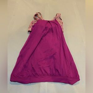 Lululemon Good used condition top with built in bra. Open back. Ask questions.